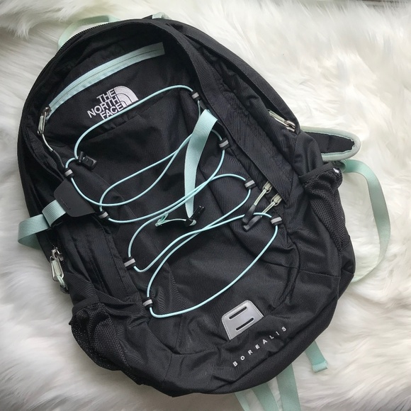 black and blue north face backpack